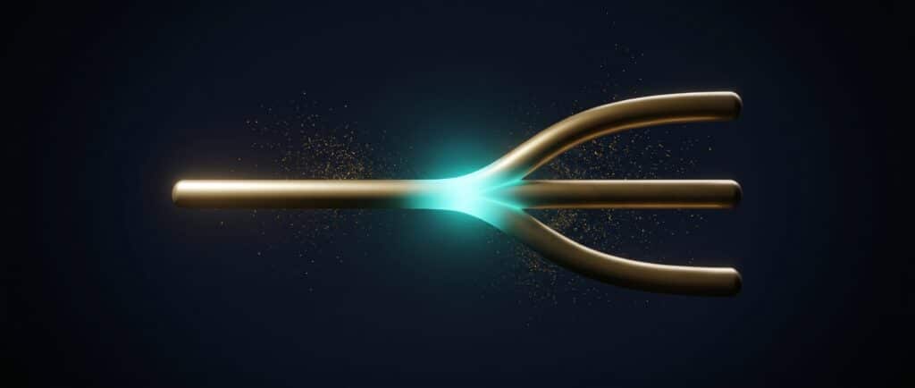 Gold band splitting into three branches at a turquoise junction on dark blue, Evolve abstract article image